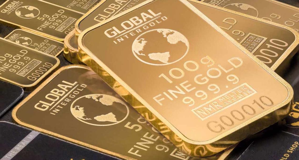 Investicione pločice od 100g i 5g na gomili.